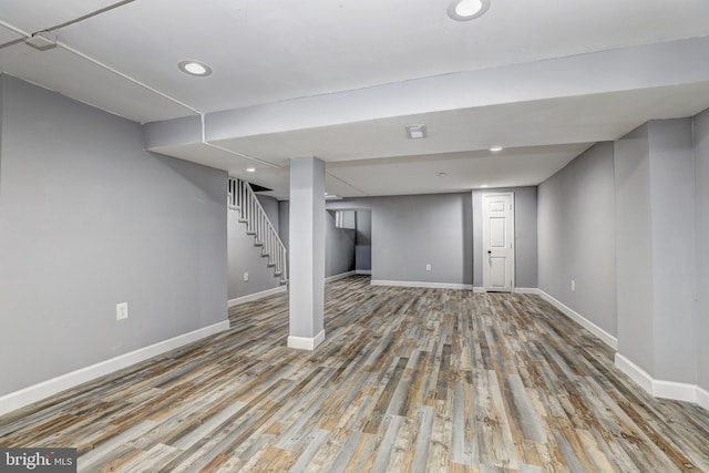 2503 W Forest Park Ave, Baltimore, MD 21215 - finished below grade area with baseboards, wood finished floors, stairs, and recessed lighting
