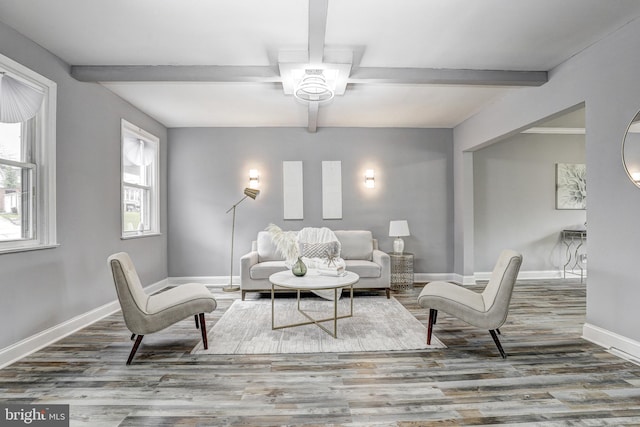 2503 W Forest Park Ave, Baltimore, MD 21215 - living area featuring wood finished floors, beam ceiling, and baseboards