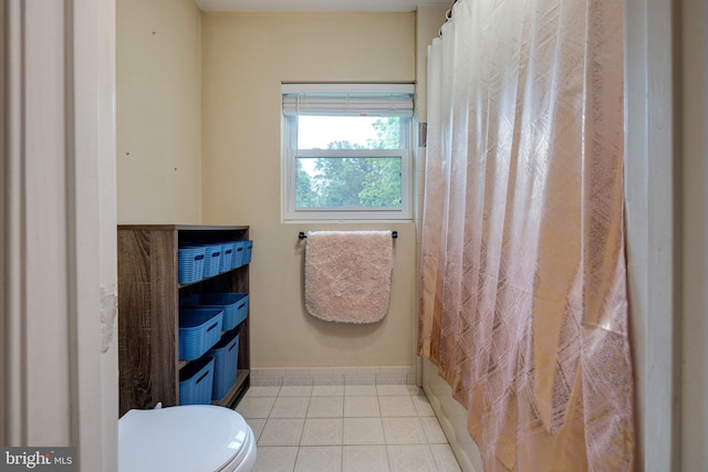 94 Eagle Ct, Woodstock, VA 22664 - full bath with toilet, baseboards, curtained shower, and tile patterned flooring
