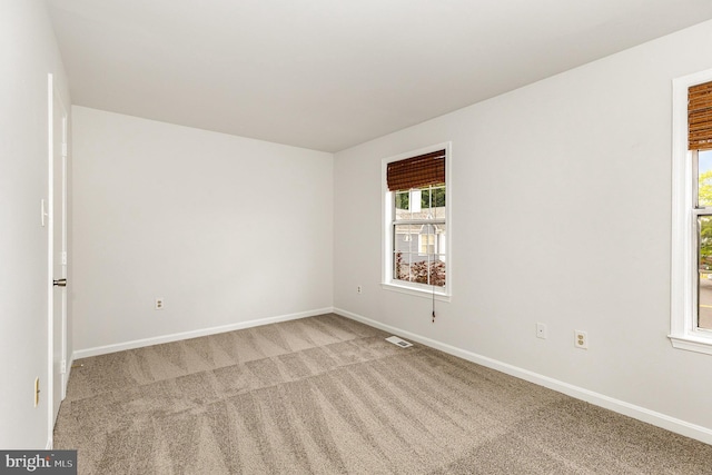 211 Westminster Ln Unit 119, Stafford, VA 22556 - empty room with light colored carpet and baseboards
