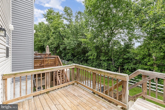 211 Westminster Ln Unit 119, Stafford, VA 22556 - wooden deck featuring view of scattered trees