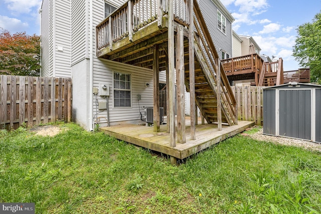 211 Westminster Ln Unit 119, Stafford, VA 22556 - back of property with a deck, stairway, and cooling unit