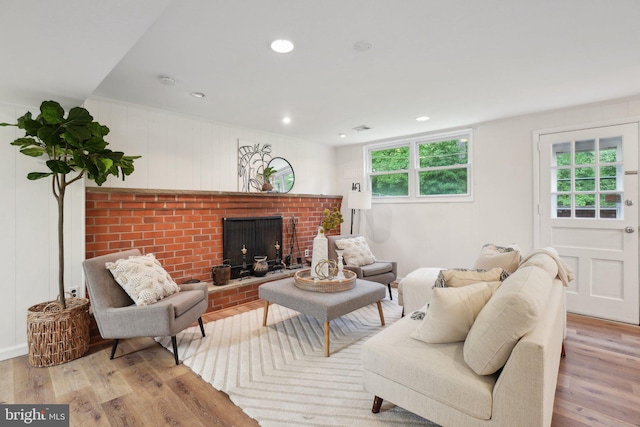 12834 Littleton St, Silver Spring, MD 20906 - living room featuring wood finished floors, healthy amount of natural light, a fireplace, and recessed lighting