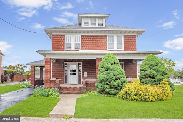 837 Broadway, Hanover, PA 17331 - traditional style home featuring brick siding, covered porch, and roof with shingles