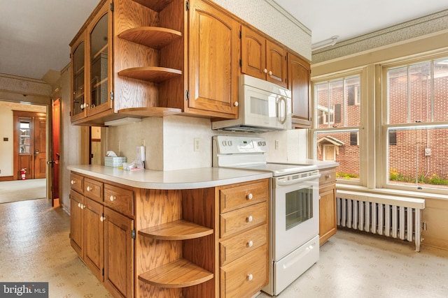 837 Broadway, Hanover, PA 17331 - kitchen featuring white appliances, open shelves, radiator heating unit, light countertops, and brown cabinets