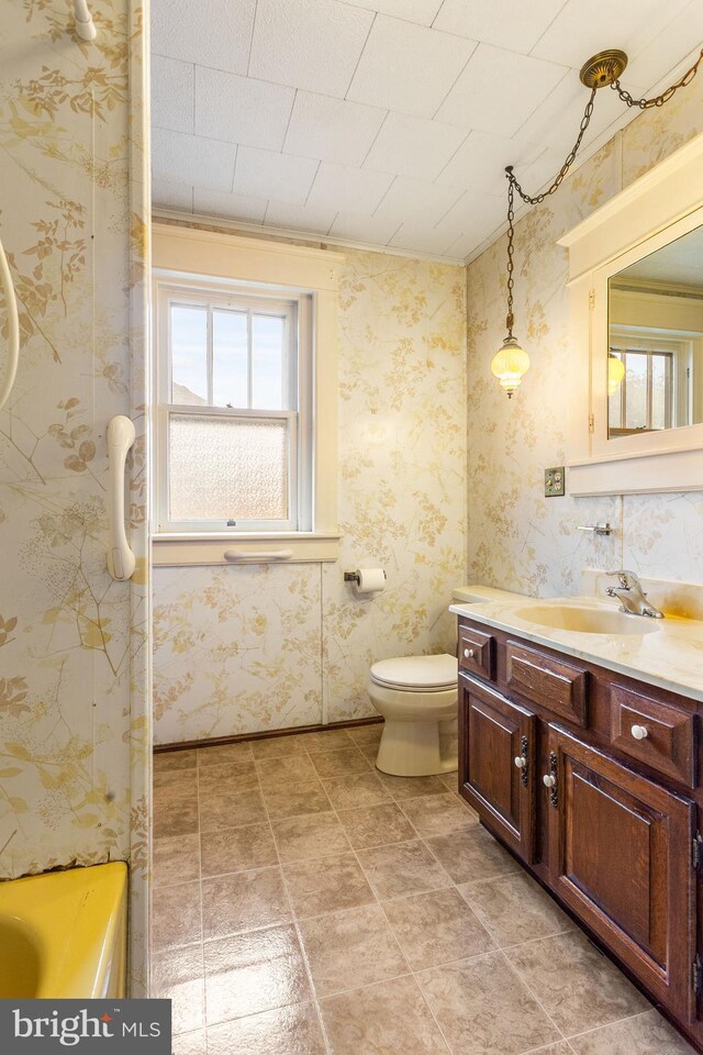 837 Broadway, Hanover, PA 17331 - full bath with vanity, a tub, toilet, and wallpapered walls