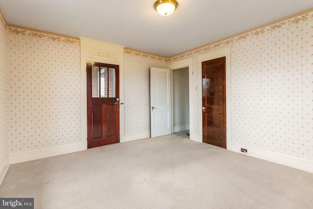 837 Broadway, Hanover, PA 17331 - empty room featuring wallpapered walls, carpet, and baseboards