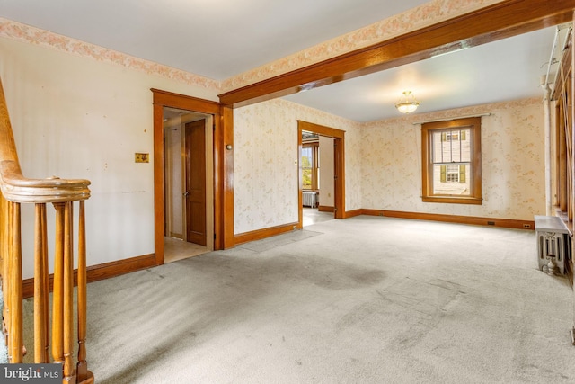837 Broadway, Hanover, PA 17331 - carpeted spare room with radiator, wallpapered walls, and baseboards
