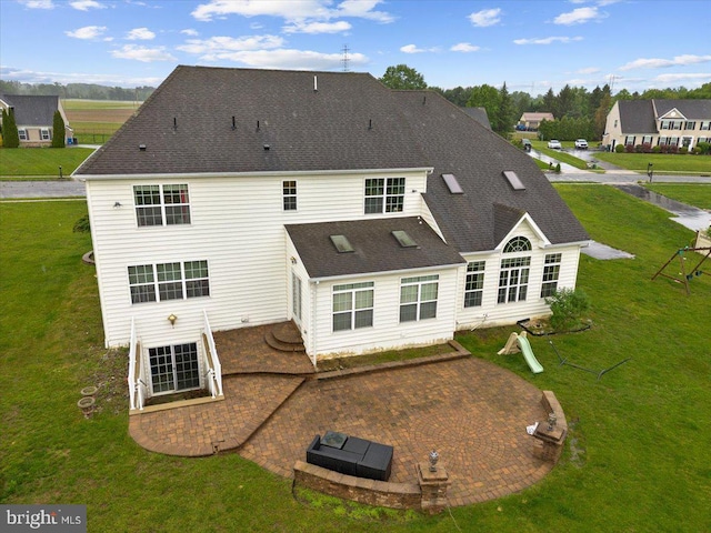 738 Farmhouse Rd, Mickleton, NJ 08056 - back of property featuring a patio area, a lawn, and a shingled roof