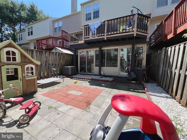 9122 Verbena Ct, Manassas, VA 20110 - back of house with a patio, a fenced backyard, and a shed