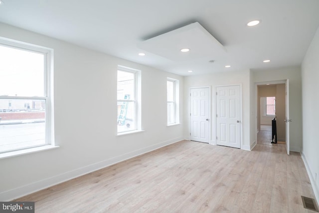 1606 Wharton St, Philadelphia, PA 19146 - unfurnished bedroom with light wood-style flooring, two closets, baseboards, and recessed lighting