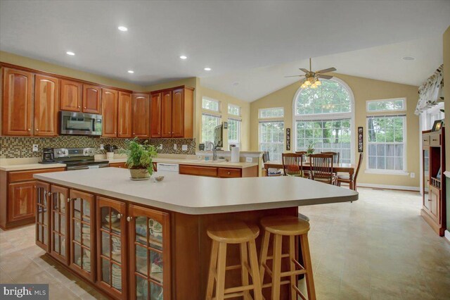 10526 Jasper Dr S, Greencastle, PA 17225 - kitchen with stainless steel appliances, a ceiling fan, a sink, light countertops, and recessed lighting