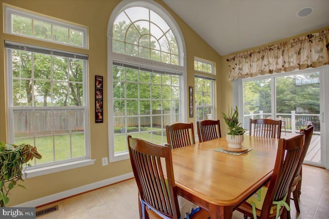 10526 Jasper Dr S, Greencastle, PA 17225 - dining space featuring baseboards and high vaulted ceiling