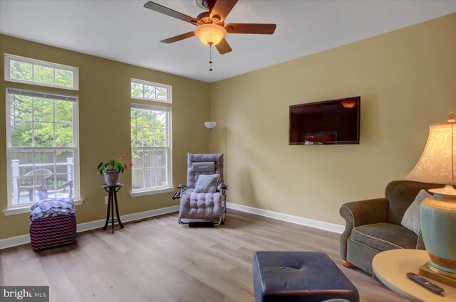 10526 Jasper Dr S, Greencastle, PA 17225 - sitting room with wood finished floors, baseboards, and ceiling fan