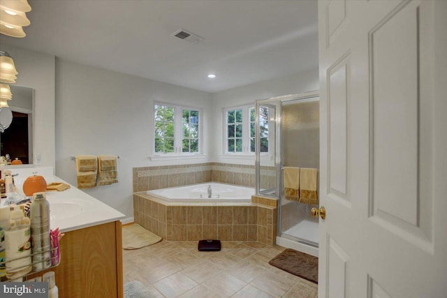 10526 Jasper Dr S, Greencastle, PA 17225 - bathroom with a bath, vanity, a stall shower, tile patterned flooring, and recessed lighting