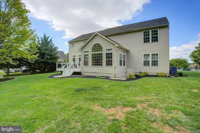 10526 Jasper Dr S, Greencastle, PA 17225 - rear view of house featuring a wooden deck and a yard