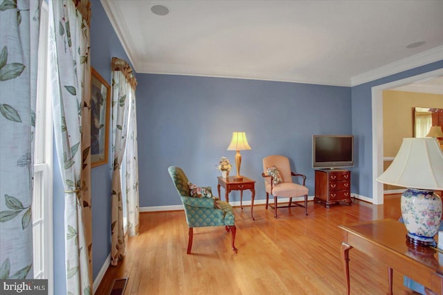 10526 Jasper Dr S, Greencastle, PA 17225 - living area with crown molding, wood finished floors, and baseboards