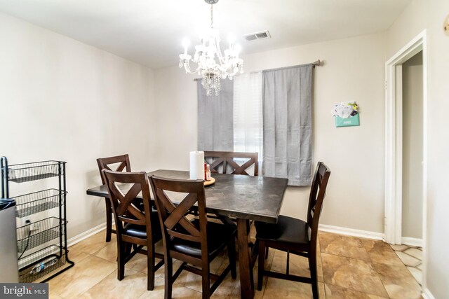 4548 Conwell Dr, Annandale, VA 22003 - dining space featuring a chandelier and baseboards