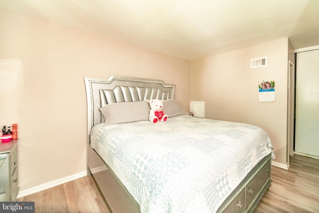 4548 Conwell Dr, Annandale, VA 22003 - bedroom with light wood finished floors, baseboards, and a closet