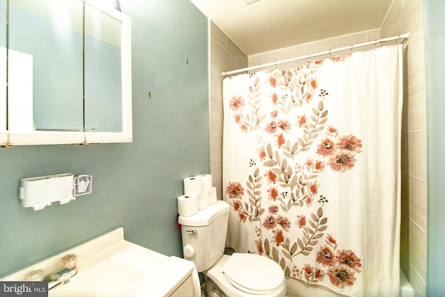 4548 Conwell Dr, Annandale, VA 22003 - bathroom with toilet, vanity, and shower / bath combo with shower curtain