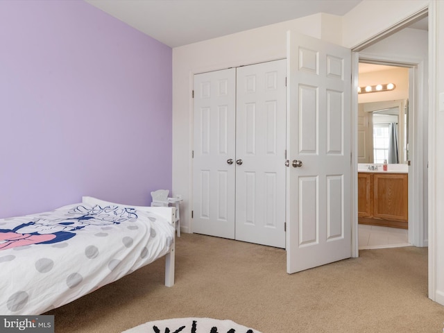 6888 Tasker Fls, Elkridge, MD 21075 - bedroom with light carpet and a closet