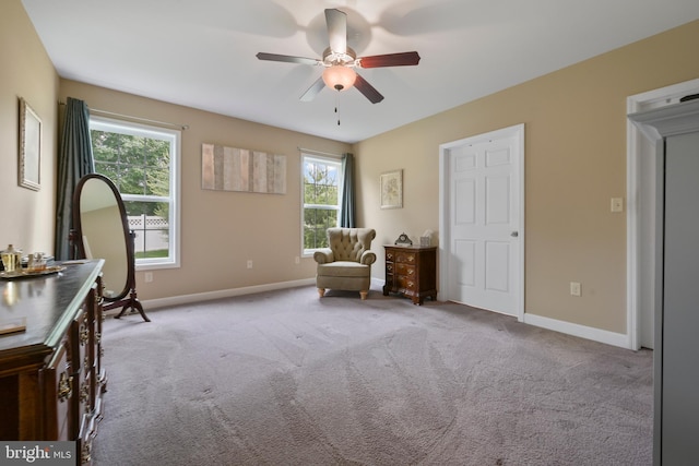1009 Rosebud St, Reading, PA 19605 - sitting room featuring ceiling fan, carpet floors, and baseboards