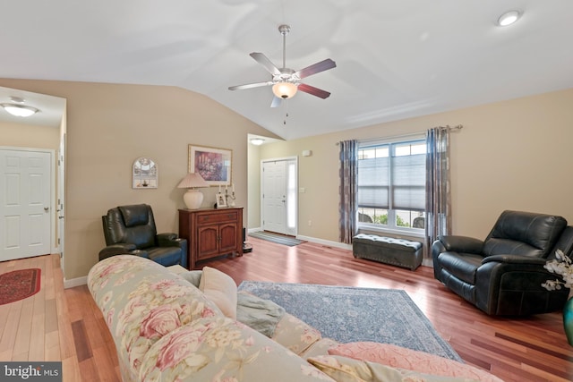 1009 Rosebud St, Reading, PA 19605 - living room with vaulted ceiling, wood finished floors, a ceiling fan, and baseboards