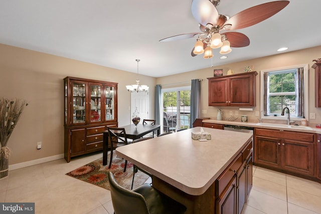 1009 Rosebud St, Reading, PA 19605 - kitchen featuring a sink, light countertops, a center island, a chandelier, and recessed lighting