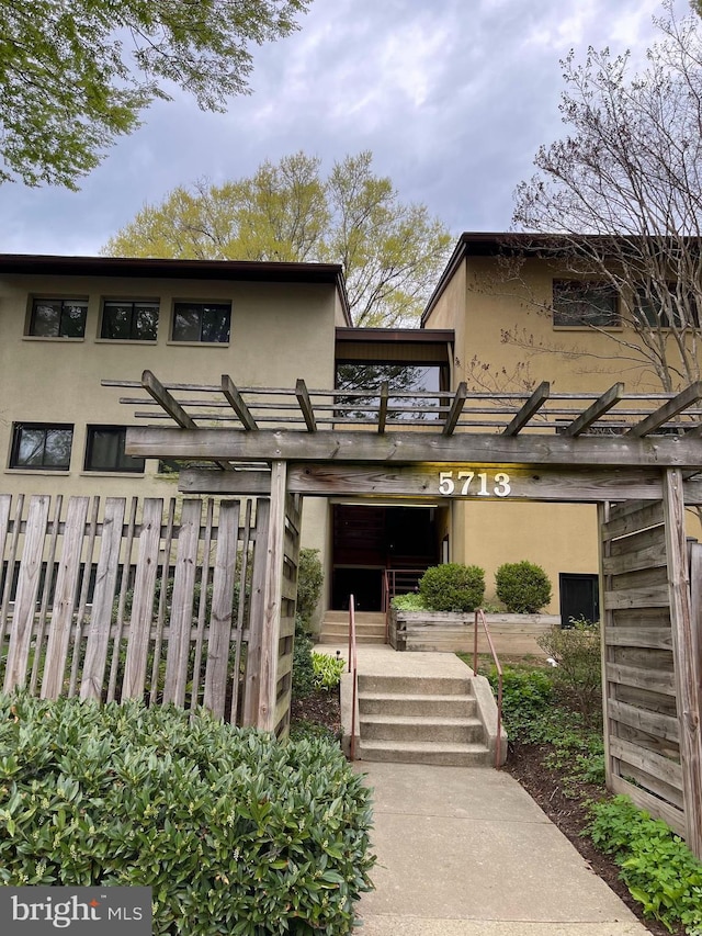5713 Harpers Farm Rd Unit A, Columbia, MD 21044 - entrance to property with stucco siding
