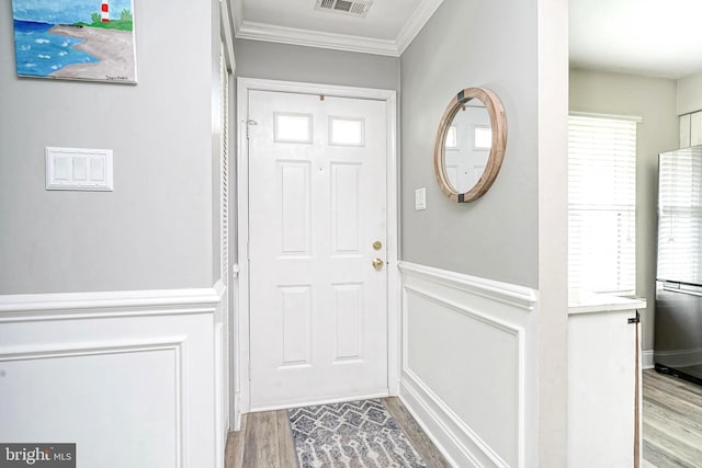 2305A Yarmouth Ln, Mount Laurel, NJ 08054 - entryway with ornamental molding, wood finished floors, plenty of natural light, and wainscoting