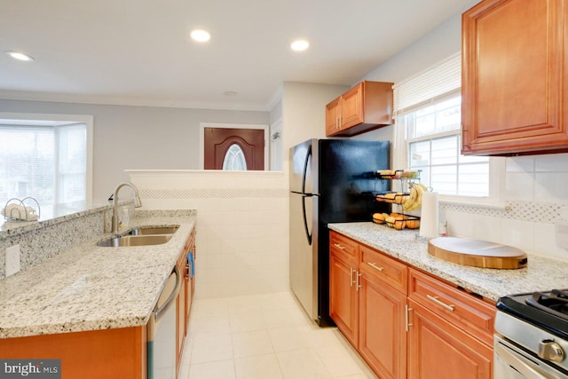 3312 Clay St, Silver Spring, MD 20902 - kitchen featuring a sink, appliances with stainless steel finishes, light stone counters, ornamental molding, and recessed lighting
