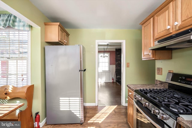 41 Collins Rd, Hamilton, NJ 08619 - kitchen with appliances with stainless steel finishes, under cabinet range hood, wood finished floors, light brown cabinetry, and baseboards
