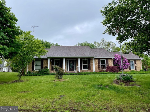 98 Magnificent Ln, Hedgesville, WV 25427 - ranch-style house featuring a front lawn, brick siding, and roof with shingles
