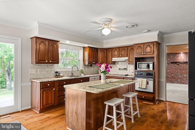 98 Magnificent Ln, Hedgesville, WV 25427 - kitchen featuring white appliances, a sink, under cabinet range hood, ceiling fan, and decorative backsplash