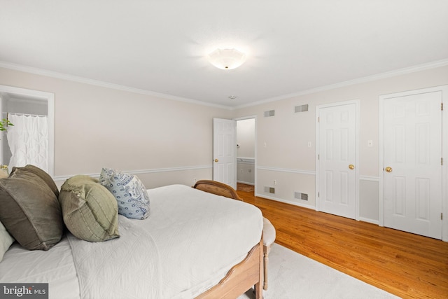 98 Magnificent Ln, Hedgesville, WV 25427 - bedroom featuring ornamental molding and wood finished floors