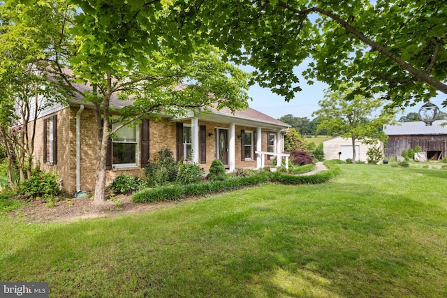 98 Magnificent Ln, Hedgesville, WV 25427 - view of front of home featuring a front lawn and brick siding