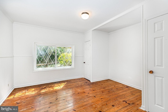 6908 S Roxbury Mill Rd, Spotsylvania, VA 22551 - unfurnished room featuring hardwood / wood-style floors, ornamental molding, and baseboards