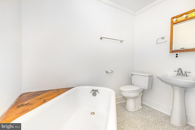 6908 S Roxbury Mill Rd, Spotsylvania, VA 22551 - full bathroom featuring a soaking tub, baseboards, toilet, a sink, and tile patterned floors