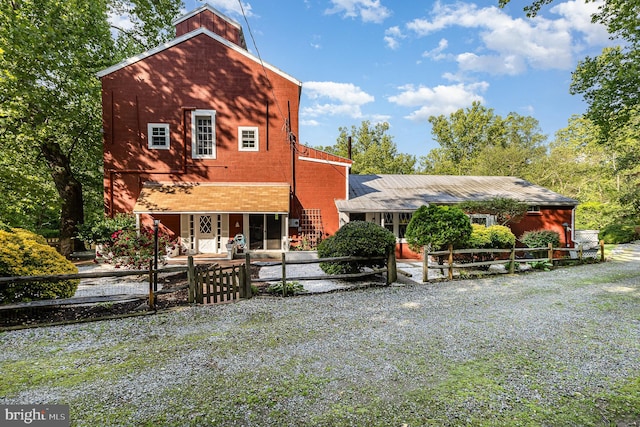 6908 S Roxbury Mill Rd, Spotsylvania, VA 22551 - view of front of home featuring a fenced front yard, brick siding, and a gate