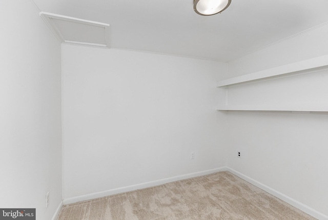 6908 S Roxbury Mill Rd, Spotsylvania, VA 22551 - laundry room featuring carpet flooring, baseboards, and attic access