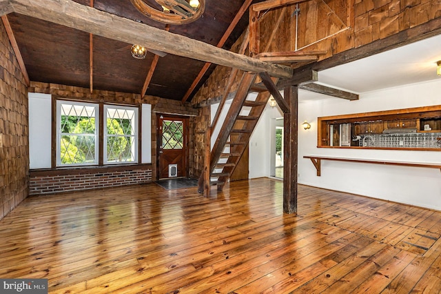 6908 S Roxbury Mill Rd, Spotsylvania, VA 22551 - unfurnished living room featuring hardwood / wood-style floors, stairway, a sink, and wooden ceiling