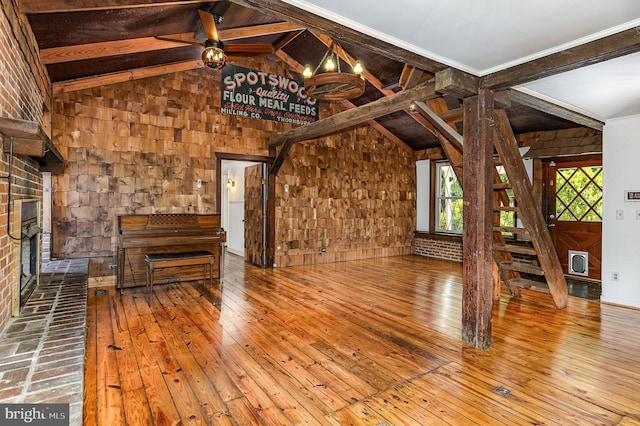 6908 S Roxbury Mill Rd, Spotsylvania, VA 22551 - unfurnished living room featuring hardwood / wood-style flooring, a ceiling fan, a fireplace, and heating unit