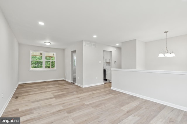 1205 Mirga Cir, Baltimore, MD 21207 - empty room featuring light wood finished floors, a chandelier, baseboards, and recessed lighting