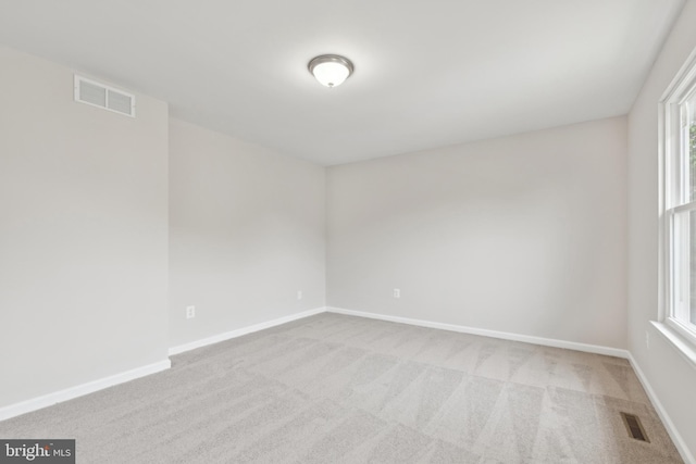 1205 Mirga Cir, Baltimore, MD 21207 - carpeted empty room with baseboards