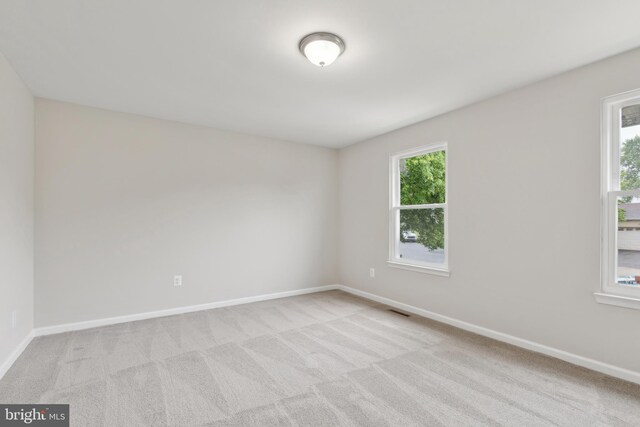 1205 Mirga Cir, Baltimore, MD 21207 - carpeted spare room with baseboards