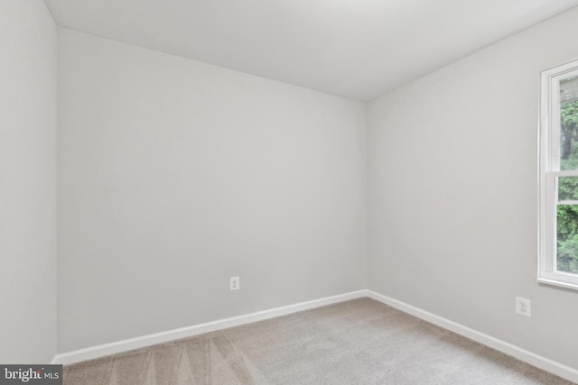 1205 Mirga Cir, Baltimore, MD 21207 - carpeted spare room featuring baseboards