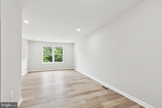 1205 Mirga Cir, Baltimore, MD 21207 - unfurnished room featuring light wood-type flooring, recessed lighting, and baseboards