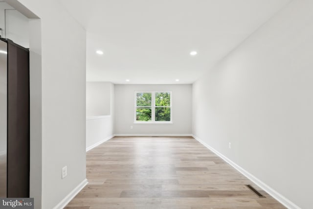 1205 Mirga Cir, Baltimore, MD 21207 - unfurnished room featuring light wood-style flooring, recessed lighting, and baseboards