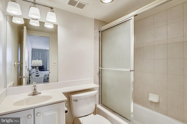 506 Brandywine House Rd Unit 506S, Bethany Beach, DE 19930 - bathroom featuring vanity, enclosed tub / shower combo, toilet, and ensuite bathroom