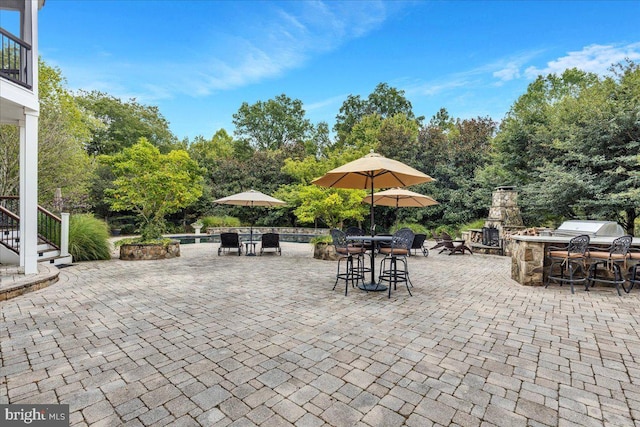 27422 Bridle Pl, Chantilly, VA 20152 - view of patio / terrace featuring outdoor dining area, view of scattered trees, and stairway